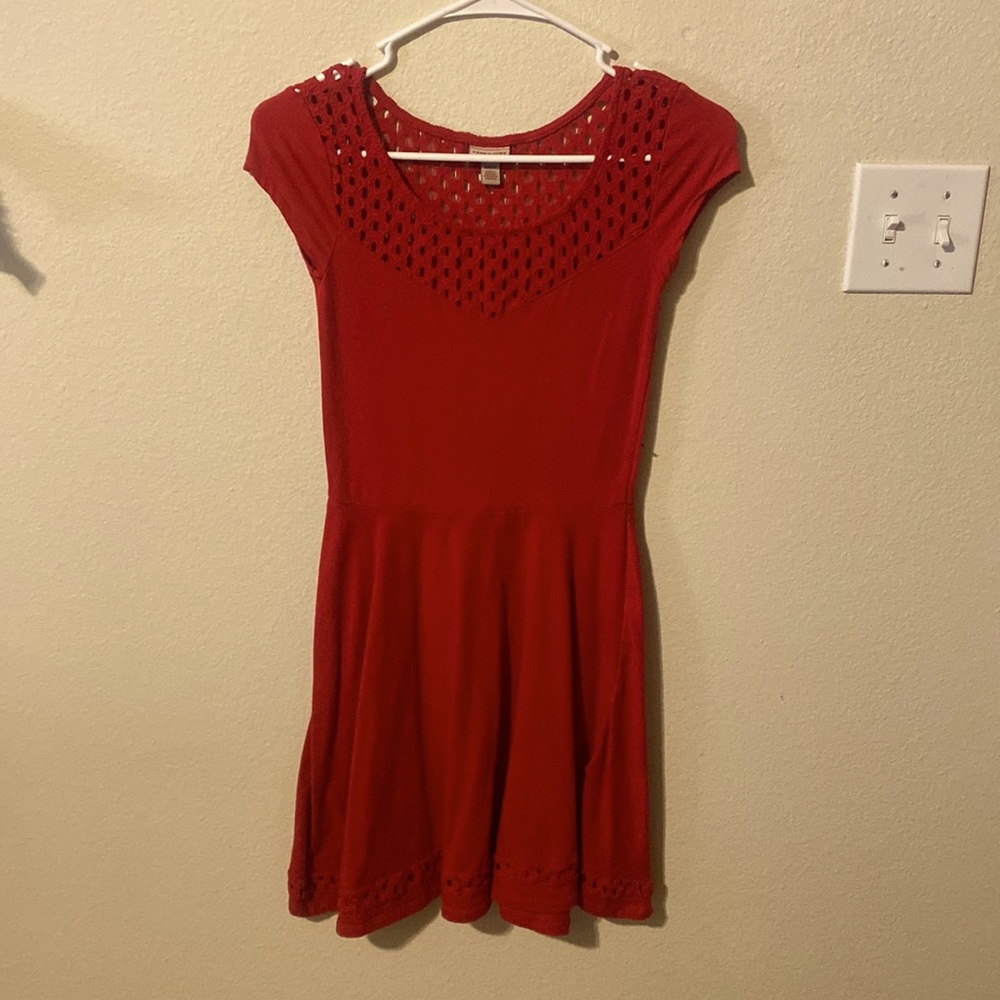 A red dress with a fun neckline! A nice dress for the holidays!